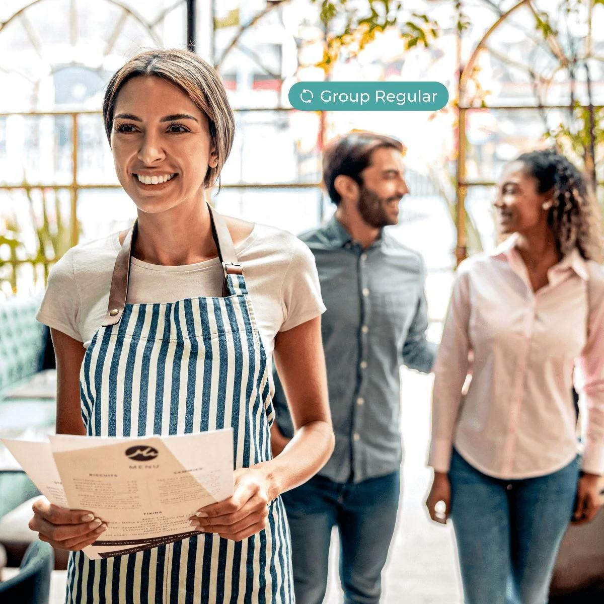 photo of waiter handing menus